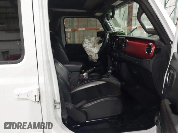 2021 Jeep Wrangler Unlimited Rubicon with VIN 1C4HJXFN2MW809904, listed as a IAAI auction lot 41567956 with 34,000 mi miles and . Bid and sale history available at DreamBid. Image 5.