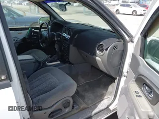 2003 GMC Envoy SLT with VIN 1GKDS13S732379218, listed as a IAAI auction lot 42164368 with Not Provided miles. Bid and sale history available at carsss.com. Image 5.