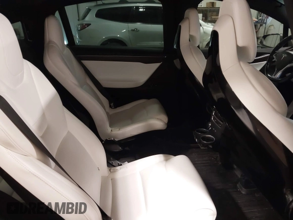2016 Tesla Model X 70D with VIN 5YJXCBE27GF004974, listed as a IAAI auction lot 41630556 with 167,709 mi miles. Bid and sale history available at carsss.com. Image 8.