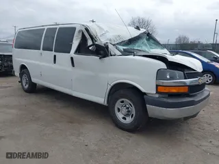 2016 Chevrolet Express Passenger LT with VIN 1GAZGPFG2G1202352, listed as a IAAI auction lot 41699012 with 1 mi miles. Bid and sale history available at carsss.com. Image 1.