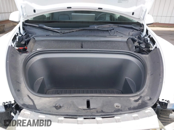 2023 Tesla Model Y Long Range with VIN 7SAYGAEE0PF787216, listed as a IAAI auction lot 41589954 with 17,985 mi miles and . Bid and sale history available at DreamBid. Image 10.