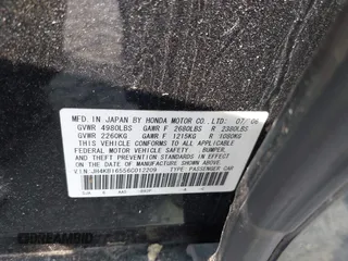 2006 Acura RL z VIN JH4KB16556C012209, wystawiony jako IAAI lot #42427472 z przebiegiem Nie podano mil oraz . Historia ofert i sprzedaży dostępna na DreamBid. Obrazek 9.