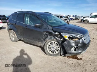 2018 Ford Escape SE with VIN 1FMCU9GD6JUB12810, listed as a Copart auction lot 82598864 with 138,640 mi miles and Salvage Title. Bid and sale history available at carsss.com. Image 4.