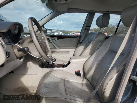 2001 Mercedes-Benz E-Class AWD with VIN WDBJH82J81X052002, listed as a Copart auction lot 82832724 with 187,464 mi miles and Salvage Title. Bid and sale history available at carsss.com. Image 7.