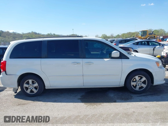 2013 Dodge Grand Caravan SXT with VIN 2C4RDGCG2DR522136, listed as a IAAI auction lot 42023561 with 176,635 mi miles and . Bid and sale history available at DreamBid. Image 13.