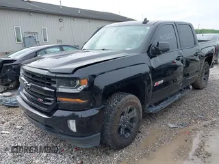2016 Chevrolet Silverado 1500 LT with VIN 1GCVKREC2GZ323737, listed as a IAAI auction lot 42176512 with 95,385 mi miles and . Bid and sale history available at DreamBid. Image 2.