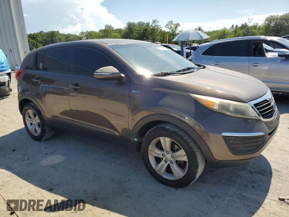 2012 Kia Sportage LX with VIN KNDPBCA20C7214959, listed as a Copart auction lot 62730645 with 194,768 mi miles and Clean title. Bid and sale history available at DreamBid. Image 4.