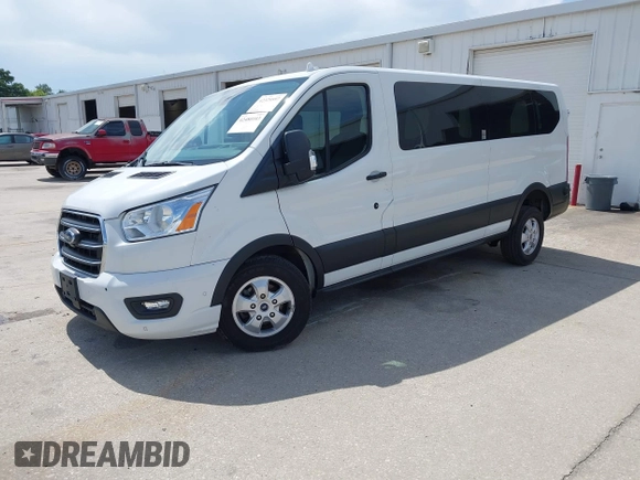 2020 Ford Transit Passenger XL z VIN 1FBAX2Y88LKA32505, wystawiony jako IAAI lot #42480103 z przebiegiem 80 204 mil mil oraz . Historia ofert i sprzedaży dostępna na DreamBid. Obrazek 2.