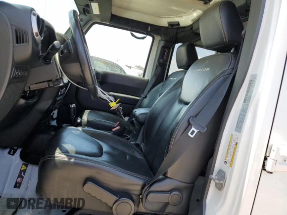 2015 Jeep Wrangler Unlimited Rubicon with VIN 1C4BJWFG6FL508493, listed as a Copart auction lot 54788635 with 127,694 mi miles and Salvage title. Bid and sale history available at DreamBid. Image 7.