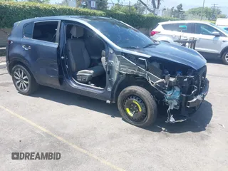2018 Kia Sportage EX z VIN KNDPN3AC2J7327289, wystawiony jako IAAI lot #42603804 z przebiegiem 104 411 mil mil oraz . Historia ofert i sprzedaży dostępna na DreamBid. Obrazek 1.