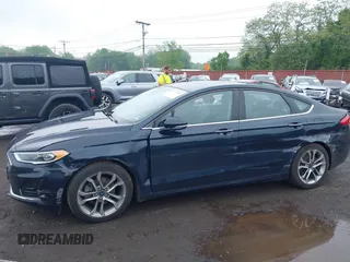 2020 Ford Fusion SEL z VIN 3FA6P0CD9LR183400, wystawiony jako IAAI lot #42271491 z przebiegiem 52 020 mil mil oraz . Historia ofert i sprzedaży dostępna na DreamBid. Obrazek 6.