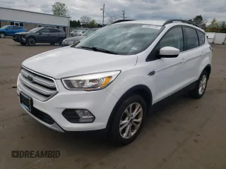 2018 Ford Escape SE z VIN 1FMCU9GDXJUA71940, wystawiony jako Copart lot #55891775 z przebiegiem 117 298 mil mil oraz Tytuł czysty. Historia ofert i sprzedaży dostępna na DreamBid. Obrazek 1.