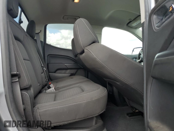 2021 GMC Canyon 2WD Elevation z VIN 1GTG5CEN5M1197513, wystawiony jako Copart lot #59479655 z przebiegiem 78 792 mil mil oraz Nie do naprawy • Non repairable. Historia ofert i sprzedaży dostępna na DreamBid. Obrazek 10.