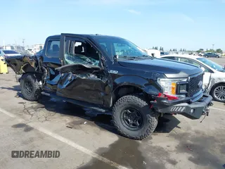 2019 Ford F-150 XL with VIN 1FTEW1EP3KFC71554, listed as a IAAI auction lot 42275266 with 57,065 mi miles and . Bid and sale history available at DreamBid. Image 1.