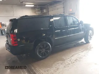 2010 Chevrolet Suburban LTZ with VIN 1GNUKKE39AR106851, listed as a IAAI auction lot 41994155 with 148,776 mi miles. Bid and sale history available at carsss.com. Image 4.