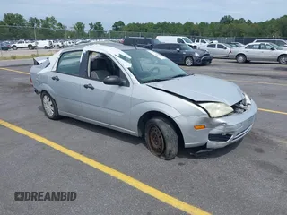 2005 Ford Focus S z VIN 1FAFP34N85W300134, wystawiony jako IAAI lot #40296705 z przebiegiem 101 000 mil mil oraz . Historia ofert i sprzedaży dostępna na DreamBid. Obrazek 1.
