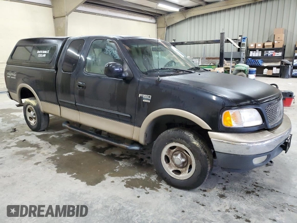 1999 Ford F-150 XL with VIN 1FTRX18L4XNB84248, listed as a Copart auction lot 52798555 with 204,943 mi miles and Salvage title. Bid and sale history available at DreamBid. Image 4.