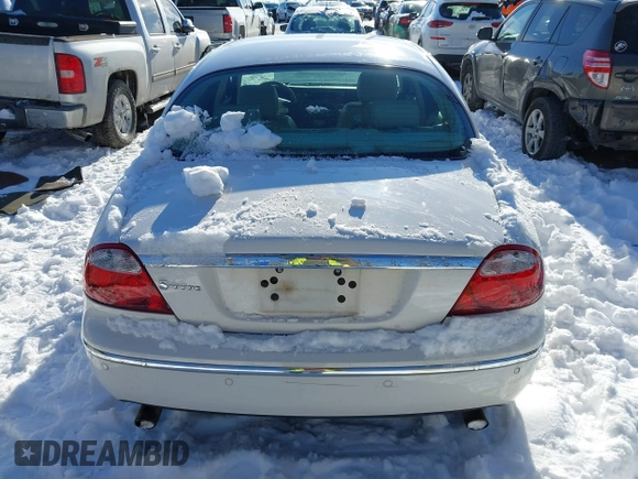 2005 Jaguar S-Type with VIN SAJWA01T75FN17656, listed as a IAAI auction lot 41282140 with 126,631 mi miles and . Bid and sale history available at DreamBid. Image 16.