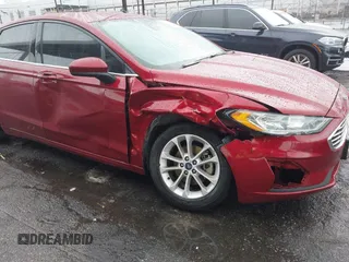 2019 Ford Fusion SE with VIN 3FA6P0HD0KR104302, listed as a IAAI auction lot 41550333 with 73,894 mi miles. Bid and sale history available at carsss.com. Image 6.