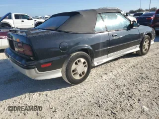 1989 Chevrolet Cavalier with VIN 1G1JF31W1K7190840, listed as a Copart auction lot 77747934 with Not Provided miles and Salvage Title. Bid and sale history available at DreamBid. Image 3.