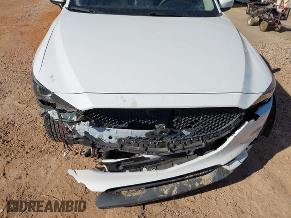 2019 Mazda CX-5 Sport with VIN JM3KFBBM0K0574255, listed as a IAAI auction lot 41661924 with 93,851 mi miles and . Bid and sale history available at DreamBid. Image 6.