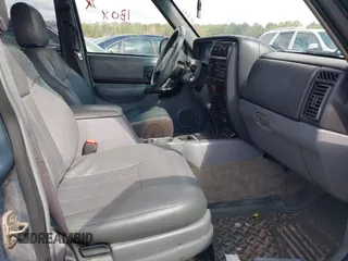 1998 Jeep Cherokee Sport with VIN 1J4FT68S0WL125382, listed as a IAAI auction lot 41551866 with 1 mi miles. Bid and sale history available at carsss.com. Image 5.