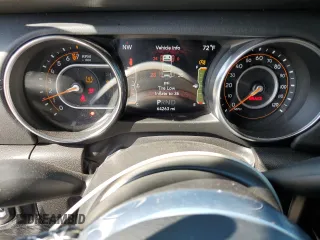 2022 Jeep Wrangler Unlimited Sahara with VIN 1C4HJXEG8NW164969, listed as a Copart auction lot 52241645 with 64,263 mi miles and Salvage title. Bid and sale history available at DreamBid. Image 9.