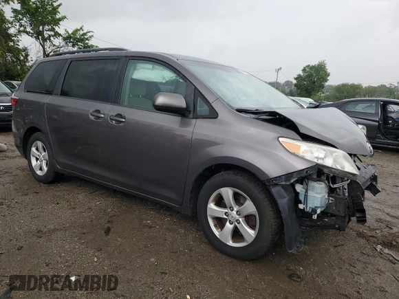 2015 Toyota Sienna LE AAS with VIN 5TDKK3DC3FS572405, listed as a Copart auction lot 58141975 with 146,820 mi miles and Salvage title. Bid and sale history available at DreamBid. Image 4.
