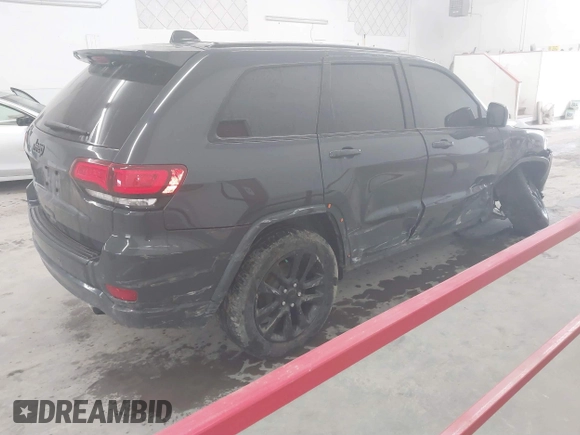 2017 Jeep Grand Cherokee Altitude with VIN 1C4RJFAG9HC886171, listed as a IAAI auction lot 41840198 with 125,616 mi miles and . Bid and sale history available at DreamBid. Image 4.