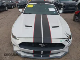 2020 Ford Mustang EcoBoost z VIN 1FATP8UH4L5120002, wystawiony jako IAAI lot #41977618 z przebiegiem 63 570 mil mil oraz . Historia ofert i sprzedaży dostępna na DreamBid. Obrazek 13.