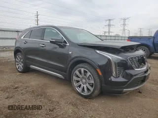 2022 Cadillac XT4 AWD Premium Luxury z VIN 1GYFZDR43NF132553, wystawiony jako Copart lot #50869955 z przebiegiem 25 412 mil mil oraz Szkody całkowita. Historia ofert i sprzedaży dostępna na DreamBid. Obrazek 4.