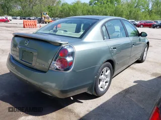 2005 Nissan Altima 2.5 S with VIN 1N4AL11D85C188734, listed as a IAAI auction lot 42064033 with 164,737 mi miles. Bid and sale history available at carsss.com. Image 4.