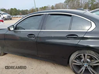 2021 BMW 3 Series 330i z VIN 3MW5R1J0XM8B73341, wystawiony jako IAAI lot #41462711 z przebiegiem Nie podano mil oraz . Historia ofert i sprzedaży dostępna na DreamBid. Obrazek 13.