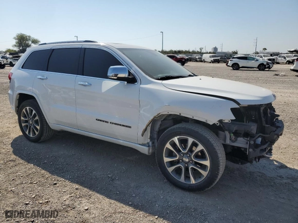 2017 Jeep Grand Cherokee Overland with VIN 1C4RJECGXHC868236, listed as a Copart auction lot 72374654 with 99,528 mi miles and Salvage Title. Bid and sale history available at carsss.com. Image 4.