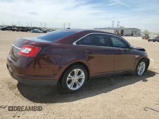 2012 Ford Taurus Limited z VIN 1FAHP2FW4CG112923, wystawiony jako Copart lot #56169085 z przebiegiem 142 687 mil mil oraz Szkoda całkowita • Salvage title. Historia ofert i sprzedaży dostępna na DreamBid. Obrazek 3.