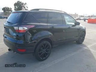 2017 Ford Escape SE with VIN 1FMCU0GDXHUC95845, listed as a IAAI auction lot 41850265 with 77,691 mi miles and . Bid and sale history available at carsss.com. Image 4.