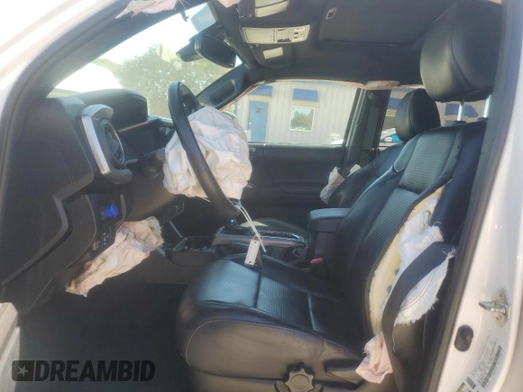 2018 Toyota Tacoma SR with VIN 3TMGZ5AN6JM127989, listed as a Copart auction lot 47944125 with 64,214 mi miles and Salvage Title. Bid and sale history available at carsss.com. Image 7.