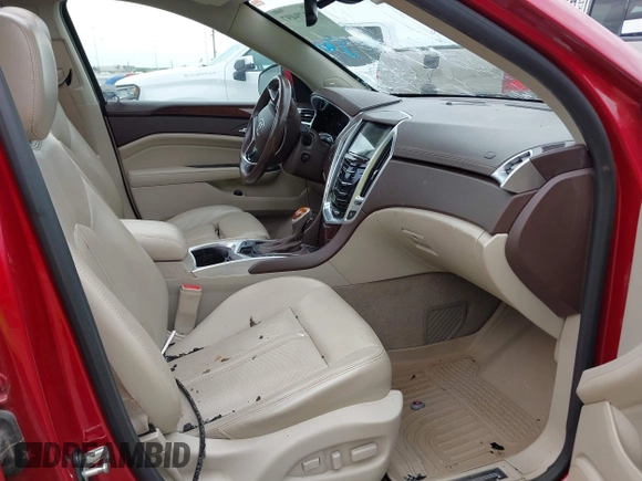 2016 Cadillac SRX Premium Collection z VIN 3GYFNDE37GS525186, wystawiony jako IAAI lot #42179497 z przebiegiem 117 200 mil mil oraz . Historia ofert i sprzedaży dostępna na DreamBid. Obrazek 5.