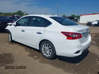 2019 Nissan Sentra S z VIN 3N1AB7AP6KY413233, wystawiony jako IAAI lot #42281572 z przebiegiem 111 297 mil mil oraz . Historia ofert i sprzedaży dostępna na DreamBid. Obrazek 3.