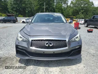 2014 Infiniti Q50 Sport with VIN JN1BV7AR4EM702521, listed as a Copart auction lot 61017205 with 61,317 mi miles and Salvage title. Bid and sale history available at DreamBid. Image 5.
