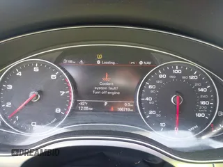 2015 Audi A6 3.0T Prestige with VIN WAUHGAFC3FN011654, listed as a IAAI auction lot 42104153 with 166,719 mi miles. Bid and sale history available at carsss.com. Image 7.