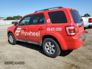 2011 Ford Escape Hybrid with VIN 1FMCU5K31BKA00016, listed as a Copart auction lot 62947255 with 390,317 mi miles and Clean title. Bid and sale history available at DreamBid. Image 2.
