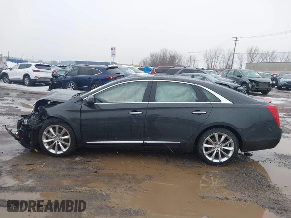 2013 Cadillac XTS Luxury z VIN 2G61R5S35D9100771, wystawiony jako IAAI lot #41673766 z przebiegiem 41 123 mil mil oraz . Historia ofert i sprzedaży dostępna na DreamBid. Obrazek 14.