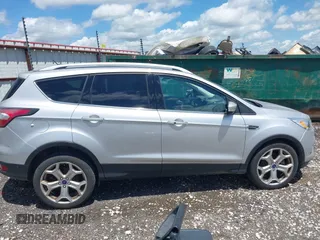 2017 Ford Escape Titanium with VIN 1FMCU0J99HUB23567, listed as a IAAI auction lot 42127795 with 93,056 mi miles. Bid and sale history available at carsss.com. Image 13.