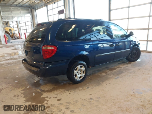 2003 Dodge Grand Caravan with VIN 2D4GP24353R195035, listed as a IAAI auction lot 41574068 with 209,165 mi miles and . Bid and sale history available at DreamBid. Image 4.
