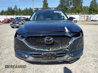 2018 Mazda CX-5 Grand Touring z VIN JM3KFBDM5J0379246, wystawiony jako Copart lot #58587865 z przebiegiem 46 339 mil mil oraz Szkody całkowita. Historia ofert i sprzedaży dostępna na DreamBid. Obrazek 5.