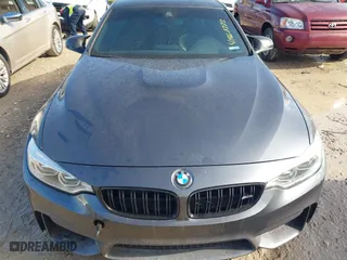 2015 BMW M4 with VIN WBS3R9C57FK334921, listed as a IAAI auction lot 41869773 with 107,058 mi miles. Bid and sale history available at carsss.com. Image 18.
