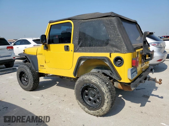 2003 Jeep Wrangler Sport with VIN 1J4FA49S43P369906, listed as a Copart auction lot 58079235 with 139,547 mi miles and Salvage title. Bid and sale history available at DreamBid. Image 2.