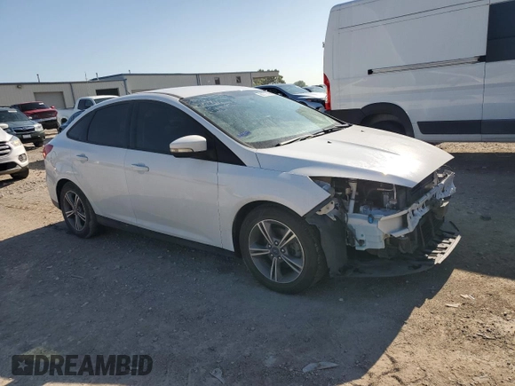 2017 Ford Focus SE with VIN 1FADP3FE8HL284169, listed as a Copart auction lot 61732695 with 70,443 mi miles and Salvage title. Bid and sale history available at DreamBid. Image 4.