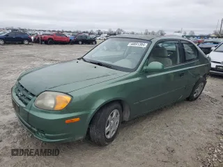 2005 Hyundai Accent GLS with VIN KMHCG35C05U356585, listed as a Copart auction lot 40091384 with 60,289 mi miles and Salvage Title. Bid and sale history available at carsss.com. Image 1.